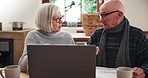 Senior, couple and stress with documents and laptop for planning or investment for retirement in living room. Elderly, person or paperwork with argument and technology at table in lounge of home