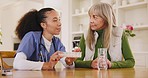 Senior woman, pills and nurse in home helping with advice for pharmaceutical, medicine and healthcare. Elderly, caregiver or talking to person with medical guide, information or consultation in house