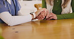 Hope, table or nurse holding hands in hospital consulting for medical test news or results for sympathy. Empathy, trust or zoom of doctor in healthcare clinic nursing or helping a sick cancer patient