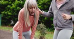 Nature, breathing and senior woman running in the garden of her retirement home for exercise. Fitness, health and elderly female person doing cardio workout with personal trainer at outdoor park.