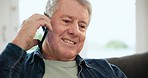 Phone call, smile and senior man in living room of retirement home for discussion or communication. Happy, technology and elderly male person on mobile conversation with cellphone in lounge of house.