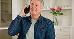 Phone call, communication and senior man in the kitchen of retirement home for discussion. Smile, technology and elderly male person on mobile conversation with cellphone in lounge of modern house.