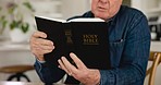 Senior man, hands and bible study with reading, religion and knowledge for connection to God in retirement. Elderly person, spiritual book and Christian worship with learning, development and peace