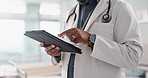 Closeup, man and doctor with a tablet, typing or connection with online results, digital app or network. Person, employee or medical professional with technology, healthcare or research with internet