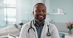 Healthcare, doctor and black man with arms crossed at hospital with smile for support, service and wellness. Medicine, professional and African expert with happiness and pride for career or surgery