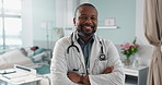 Medicine, doctor and black man with arms crossed at hospital with smile for support, service and wellness. Healthcare, professional and African expert with happiness and pride for career and surgery