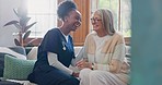 Senior patient, funny or happy caregiver talking for healthcare support at nursing home clinic. Smile, women laughing or nurse speaking of joke to a mature person or woman in a friendly conversation