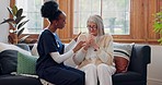 Senior, sad woman or caregiver with empathy or results in consultation for bad news or cancer disease. Stress, crying or nurse with a depressed patient for nursing support, sympathy or help in home