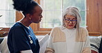 Senior, sad woman or nurse with support or results in consultation for bad news or cancer disease. Stress, depression or caregiver with a crying mature patient for empathy, sympathy or help in home