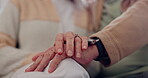 Hands, support and a senior couple closeup in their home for love, sympathy or trust during retirement. Hope, healing and empathy with elderly people on a sofa in the living room of their home