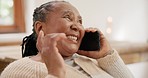 Woman, grandmother and talk by phone call at home with friends, family and laugh on holiday, vacation or trip. African person, excited and gossip for speaking on mobile for communication with people