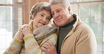 Home, hug and senior couple with love, retirement and support with happiness, kindness and bonding. Apartment, elderly woman and old man embrace, marriage and commitment with romance, trust and relax