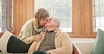 Home, hug and senior couple with marriage, kiss and commitment with retirement, support and kindness. Happiness, elderly woman and old man embrace, romance, trust and bonding with care, calm and love