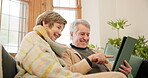 Home, love and senior couple with tablet, funny and social media with online reading, post and website info. Apartment, elderly woman and happy old man with technology, laughing and search internet