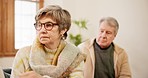 Home, fight and senior couple with divorce, ignore and argument with drama, retirement or angry. Apartment, elderly woman or old man on a sofa, mistake or marriage with problem, frustrated and crisis