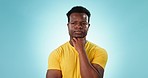 Thinking, brainstorming and black man with solution, question or decision on blue studio background. African person, problem solving or model with planning, emoji and doubt with inspiration or choice