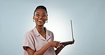 Face, woman and smile with laptop in studio for mockup on blue background for e commerce, email or web. African, person or model with laugh for blog, website or social media with technology for work