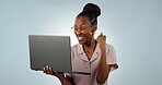 Winner, celebration or excited black woman with laptop in studio isolated on white background. Ecommerce profit, yes or happy person with computer for goals, target achievement or victory success 