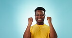 Surprise, face and black man celebrate, excited or happy for success news, studio announcement or achievement. Victory, OMG portrait and winner cheers, applause or shocked reaction on blue background