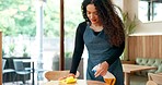 Waitress woman, spray and cleaning table for hygiene, bacteria and shine in coffee shop with smile. Girl, barista and cleaner with ppe gloves, chemical and cloth for catering, restaurant or cafe job