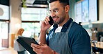 Barista, phone call and tablet for restaurant communication, online management or customer service in cafe. Small business owner, waiter or man on mobile and digital inventory for coffee shop startup