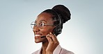 Call center, customer support and a happy black woman consulting in studio on a gray background. Face, smile and contact with a young receptionist or consultant talking for telemarketing sales