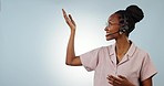 Call center, talking and happy black woman gesture at telemarketing news, customer care announcement or sales pitch. Portrait advisor, mockup studio space and speaker presentation on blue background