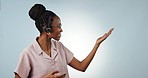 Customer service, talking and happy black woman gesture at networking info, customer care consultation or announcement. Portrait agent, mockup studio space and speaker presentation on blue background