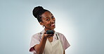 Waitress, black woman and pos machine for payment, finance and banking. Portrait, smile of cashier and barista at point of sale in small business isolated in studio on a blue background mockup space