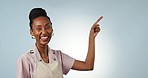 Face, black woman or pointing in studio to mockup space in apron with smile, offer or cafe choice. Blue background, promotion or happy African waitress advertising business, discount or special deal