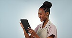 Studio, black woman or business owner on tablet for cafe management, research or online inventory. African entrepreneur, happy or restaurant waitress typing on digital technology on blue background