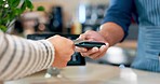 Customer, cafe and pos machine with credit card for payment, transaction or checkout counter. Closeup of person, hands and tap or paying barista with debit for coffee, tea or beverage at restaurant