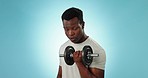 Black man, dumbbell and weightlifting, fitness and bodybuilder in studio with power on blue background. Strong, muscle training and mockup space with exercise, workout for bodybuilding and equipment