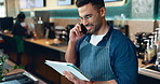 Man, phone call and tablet for restaurant communication, online management or customer service in cafe. Small business owner, waiter or barista on mobile and digital inventory for coffee shop startup