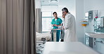 Medicine, hospital and a healthcare team of doctors checking on a patient in recovery or rehabilitation. Medical, teamwork and consulting with a group of health professionals in a clinic for wellness