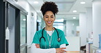 Healthcare, face and woman or nurse with arms crossed for wellness, trust and service in hospital or clinic. Portrait, person or doctor with happiness for career, cardiology or nursing at workplace