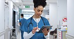 Woman, doctor and tablet walking at hospital for research, schedule planning or communication in hallway. Female person, nurse or medical worker with technology for Telehealth or networking at clinic