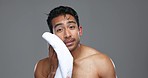 Asian man, shower and towel for grooming, hygiene or drying body against a grey studio background. Portrait of male person cleaning face, dry or sweat for clean skin, health or wellness on mockup