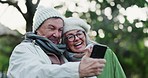 Selfie, travel and senior couple in park for social media, online post and profile picture on adventure. Retirement, nature and happy man and woman take photo on holiday, vacation or weekend outdoors