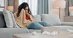 Sick, allergies and woman sneezing on a sofa with tissue paper for nasal, cleaning or virus at home. Flu, stress and female person blowing nose in living room with viral infection, bacteria or covid