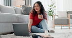 Woman, coffee and laptop for work from home planning, online research and happy freelancer career on floor. Young person with coffee break, computer for virtual career and relax on living room carpet