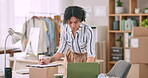 Woman, computer and writing on e commerce documents, stock order or product checklist for online shop planning. Startup fashion designer or small business owner on laptop, clothes invoice or delivery
