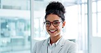 Smile, face and business woman in the office with positive, good and confident attitude. Happy, portrait of professional female lawyer from Colombia with happiness and pride standing in workplace.