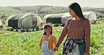 Chicken, family and mother with girl on farm for holiday, adventure and vacation in countryside. Agriculture, farming and mom holding hands with child with livestock for poultry or agro business