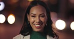 Laughing, night and face of a woman in the city for a joke, relax or weekend fun in the town. Happy, portrait and a young girl with confidence, funny and comic expression in the dark of the street