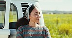 Road trip, happy and woman by car for travel, holiday and vacation on drive in countryside road. Nature, happiness and person in motor vehicle for transport on adventure, freedom and journey outdoors