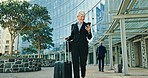 Business woman, suitcase and phone in city with funny communication, transport meme and travel news or flight. Corporate boss with happy mobile chat, luggage and walking outdoor to airport or hotel 