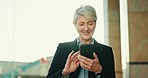 City, business and senior woman with a cellphone, typing and contact with online reading, walking and email. Consultant, employee and worker with digital app, smartphone and search internet with sms