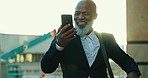 Phone, news and senior business man in a city jump for wow text, email or notification outdoor. Smartphone, success and excited elderly African male ceo downtown with investment growth celebration