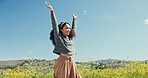 Happy, woman and dance in field with flowers in spring, summer or floral landscape in nature or countryside. Natural, happiness or lady spinning, dancing or smile in outdoor environment with wellness